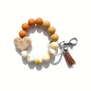 Featuring earthy gradients, floral prints, and unique focal charms.