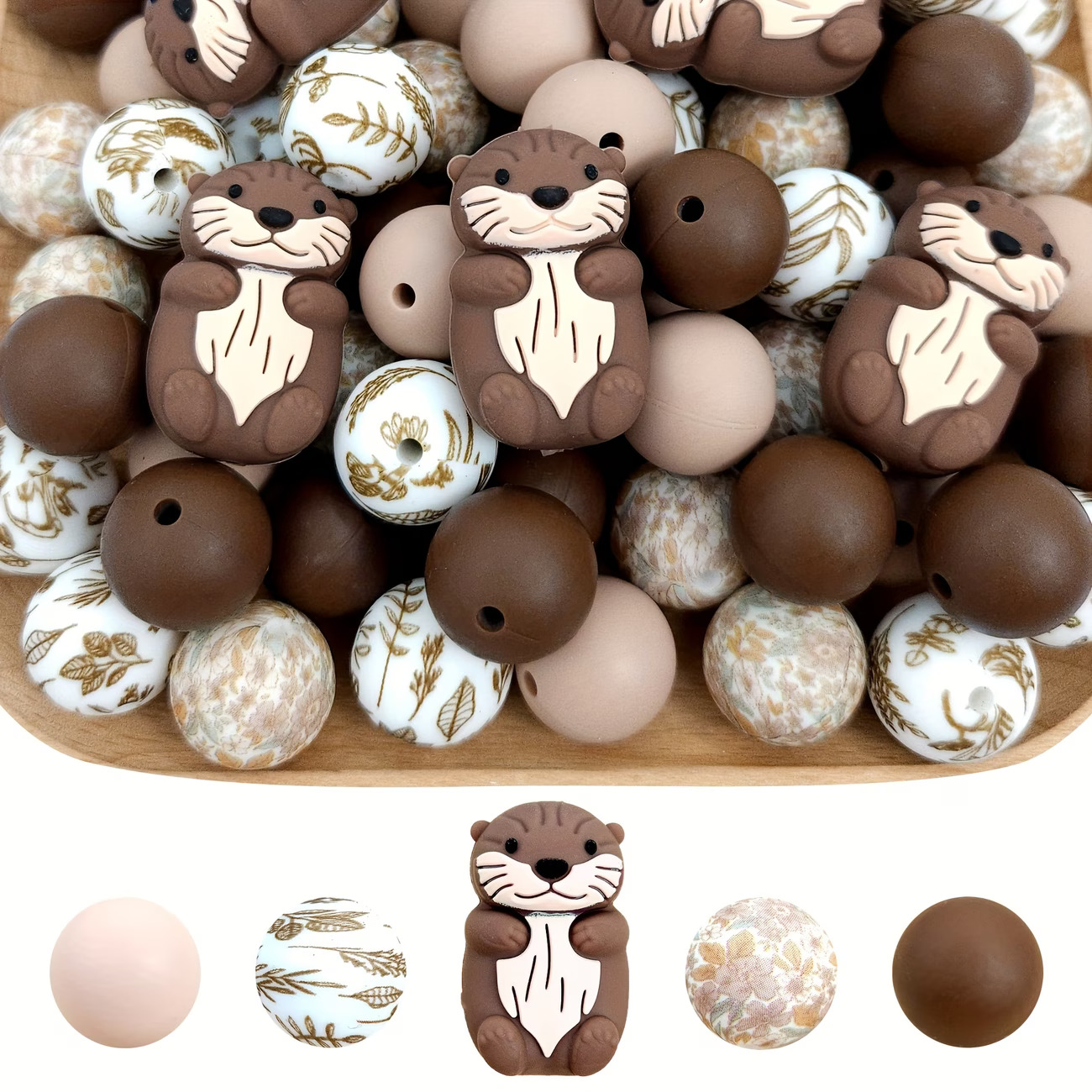 A 25-piece DIY silicone bead kit featuring cartoon brown river otter focal beads, solid chestnut brown and beige round beads, and patterned beads with vintage floral and golden botanical leaf prints.